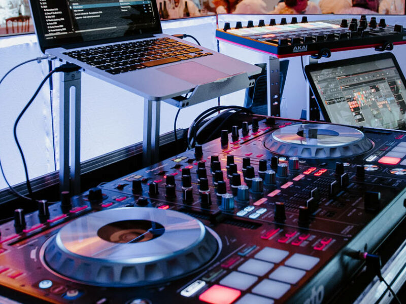 a set of dj equipment with a laptop