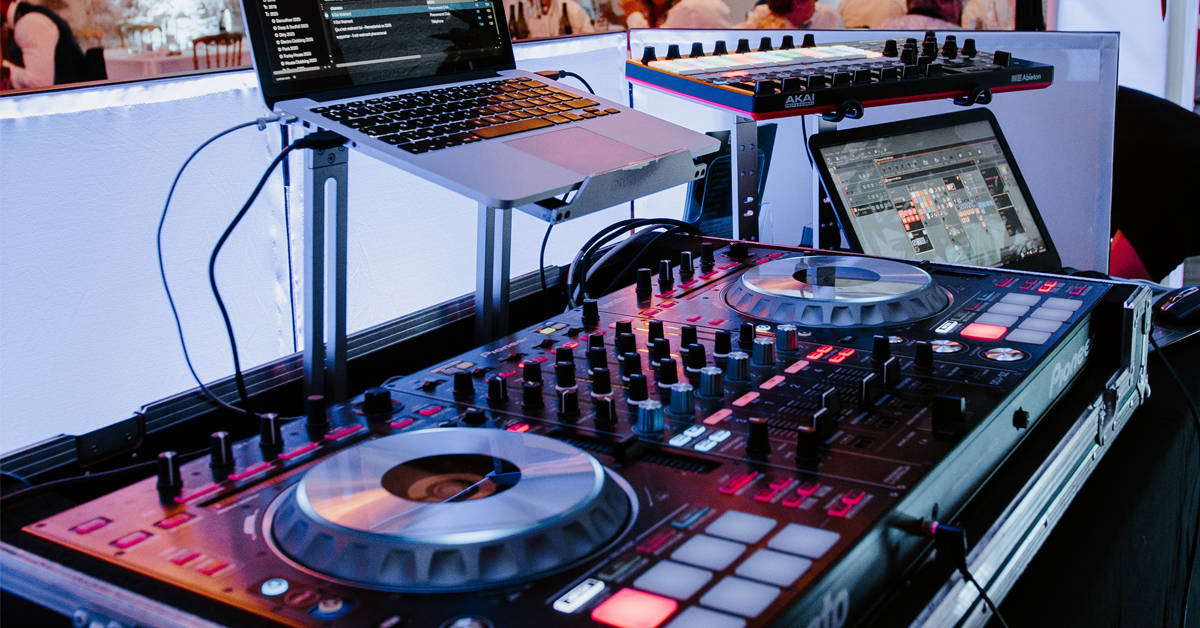 a set of dj equipment with a laptop